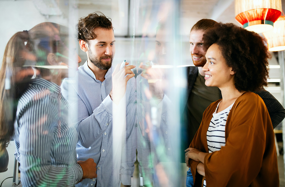 Employees collaborating in office